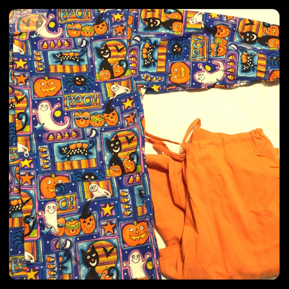 Halloween scrub jacket and pants.